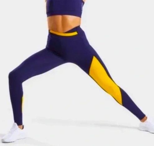 Gymshark Asymmetrical Leggings Navy/Yellow - $32 - From Bambi