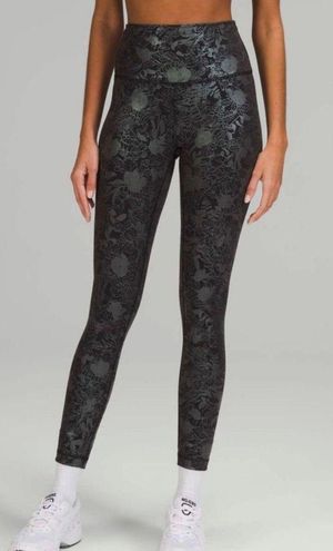 Lululemon black embossed wunder train high rise tight, size 2 (25