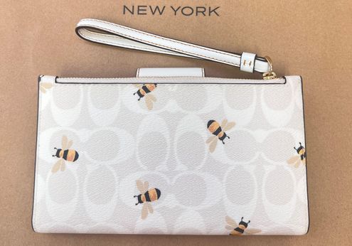 Coach Outlet Tech Wallet In Signature Canvas With Bee Print