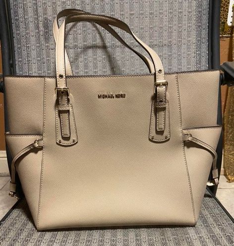 MK tan purse