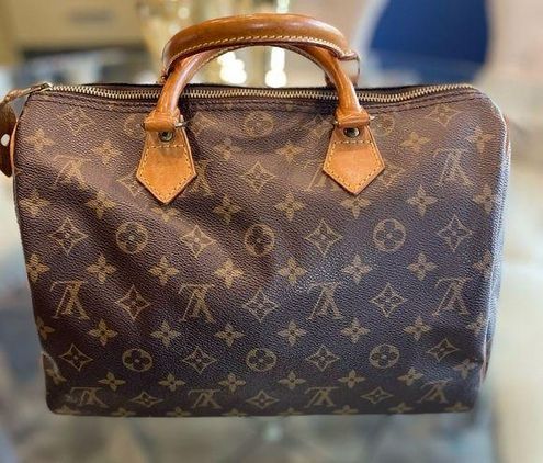 Authentic Louis Vuitton Speedy 25 in Monogram Canvas and Vachetta Leather