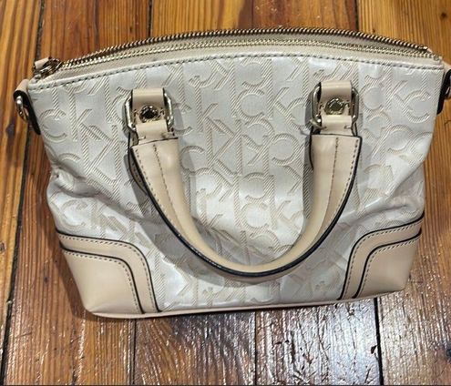 Calvin Klein top handle mini bag Tan - $15 (83% Off Retail) - From mandi