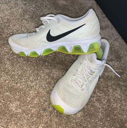 white and neon green nikes