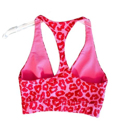 BEACH RIOT Twist Sports Bra in Famous High Risk Red Leopard