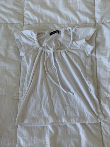 Brandy Melville White Tie Front Top - $19 (17% Off Retail) - From Brenna