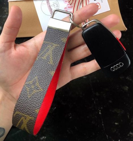 Re-purposed LV Embossed Dolly wristlet