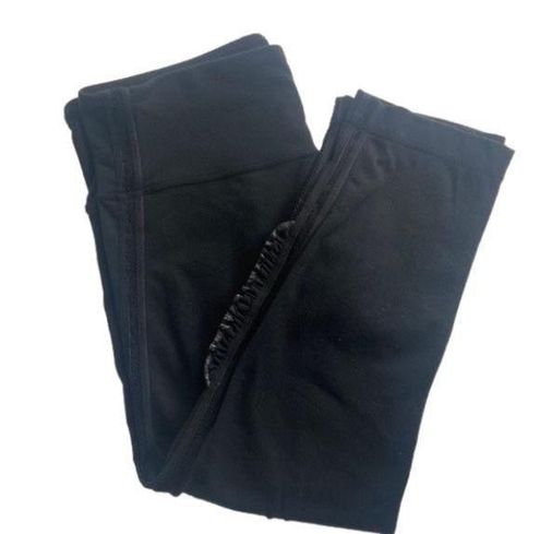 Lululemon crop leggings-women's size 8 -black with ruffle on lower leg -  $38 - From Melena