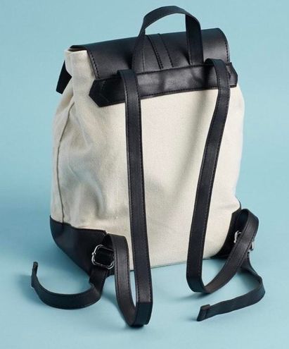 de lux demi backpack
