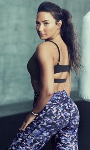 Demi Lovato for Fabletics blue sports bra and leggings