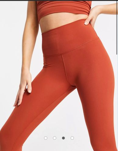 Nike Yoga luxe 7/8 leggings in rust orange XS - $81 - From Bbluxwins