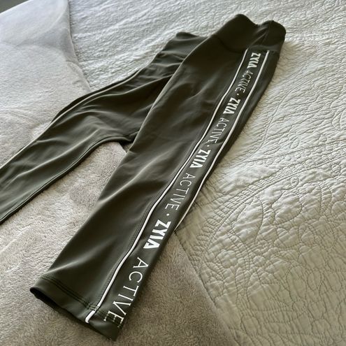 Zyia olive logo stripe light n tight capri Size 6-8 NWOT, compression  leggings - $34 - From Jamie