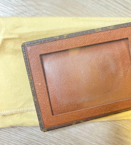 Louis Vuitton compact wallet from seller “Jerseyland020”. Took 21 days to  receive in the U.S., cost $27.76. Has a soft outside touch with  rough/strong inside feel. Nice stitching and know it'll last