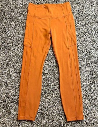 Athleta Ultimate Stash 7/8 Tight Legging Orange Athletic Pants - $48 - From  Jilly