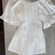 Nasty Gal Pearl white off the shoulder romper Photo 3