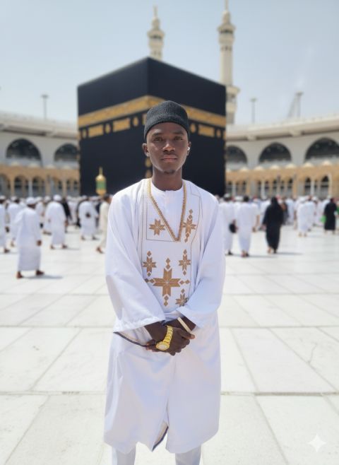 Stylish model with MacBook on beanbag fashion photo