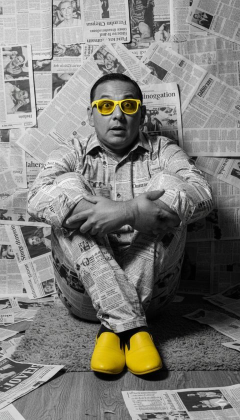 Surreal man in yellow sunglasses pop art newspaper photograph
