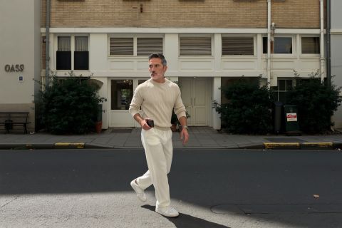 Cinematic urban street style modern refined man neutral hues