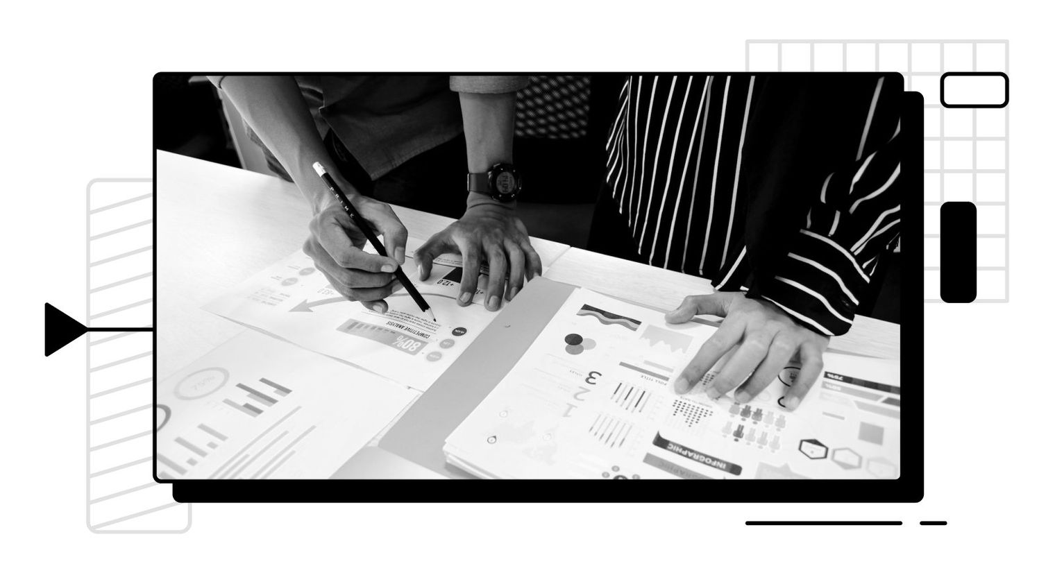 Photo of hands going through charts.