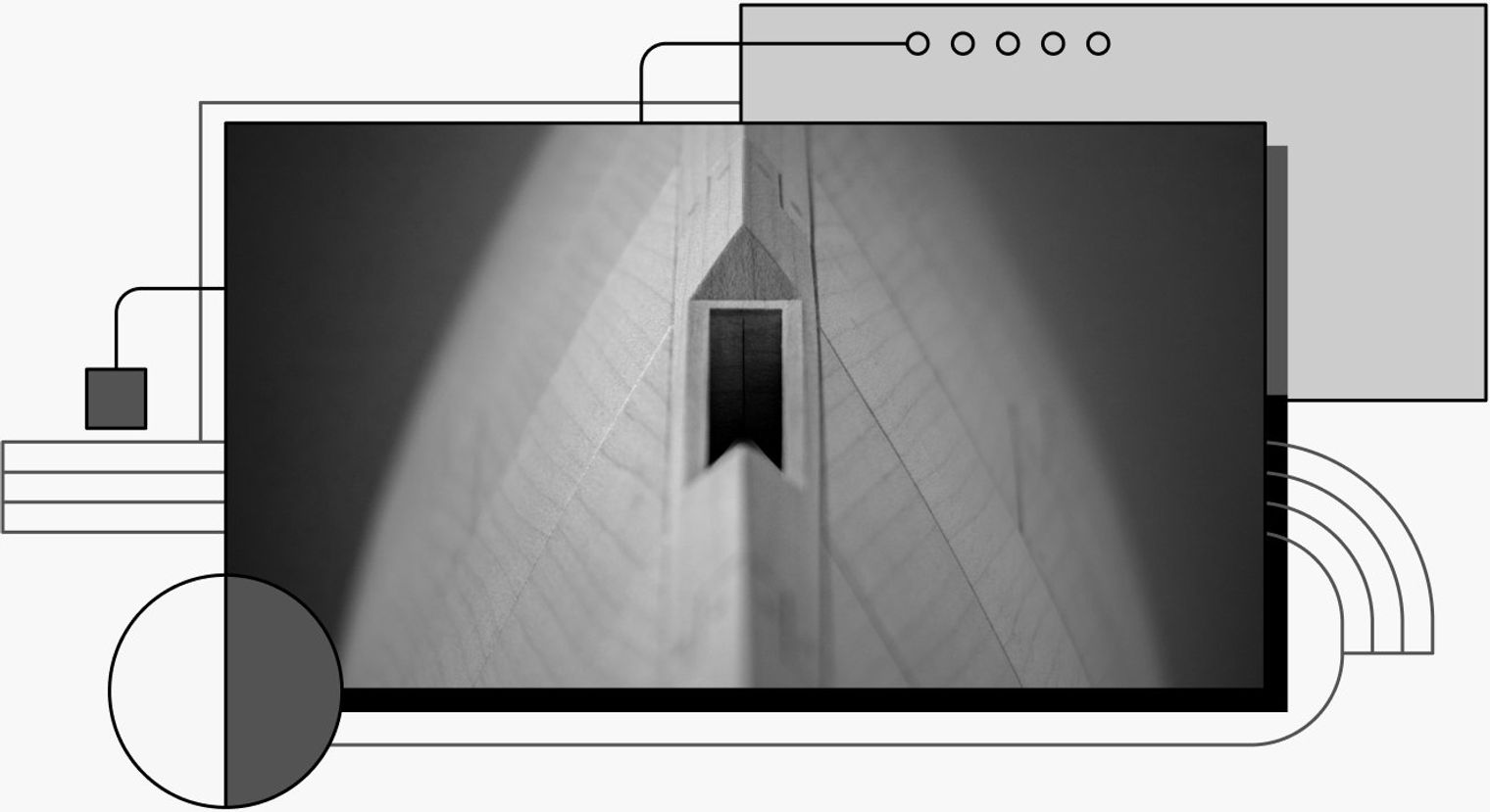 A rectangular hole in a wooden pyramid.