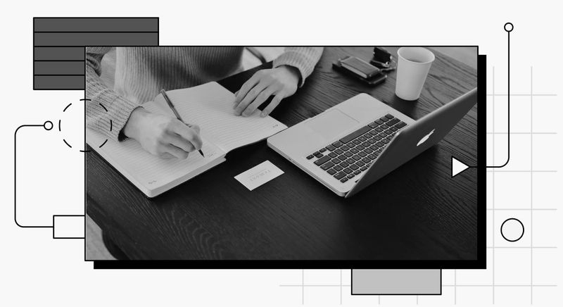 Image of a person in their laptop.