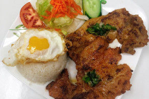 505. Grilled Pork Chop, Chicken & Fried Egg