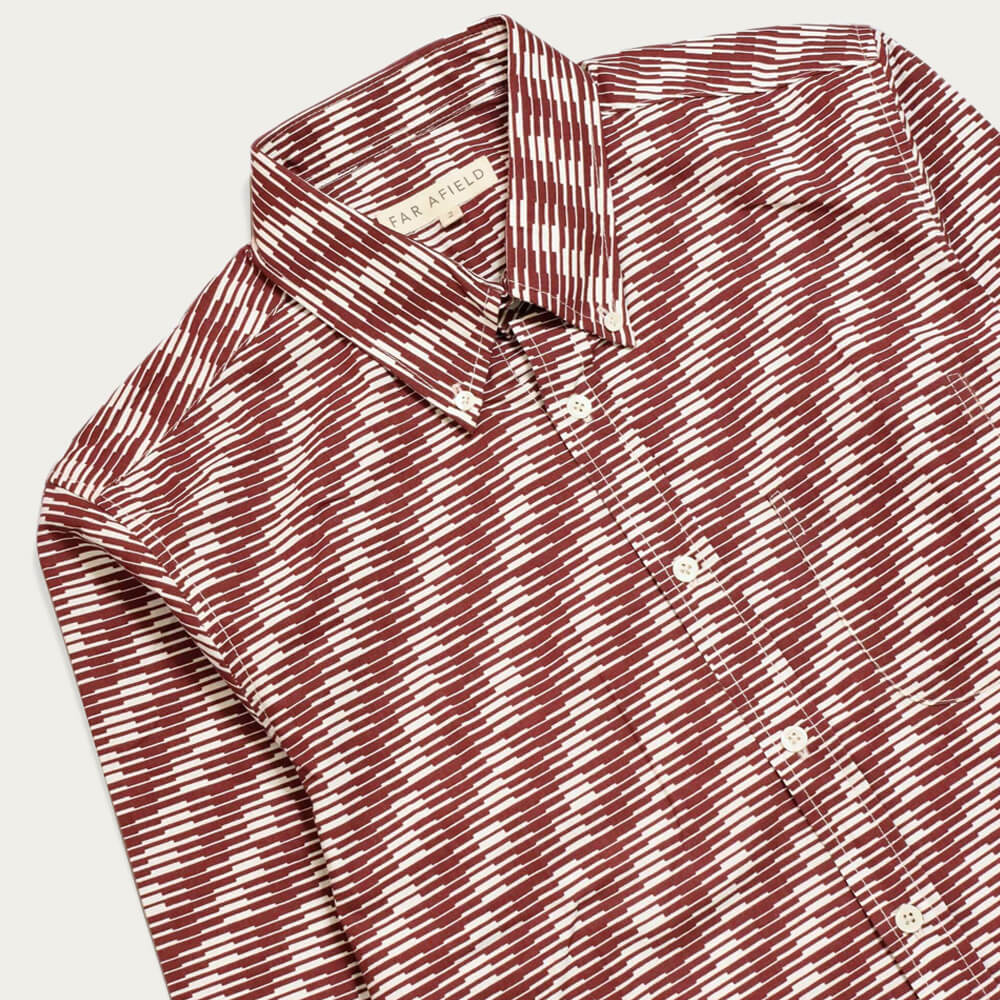 maroon shirt with white print