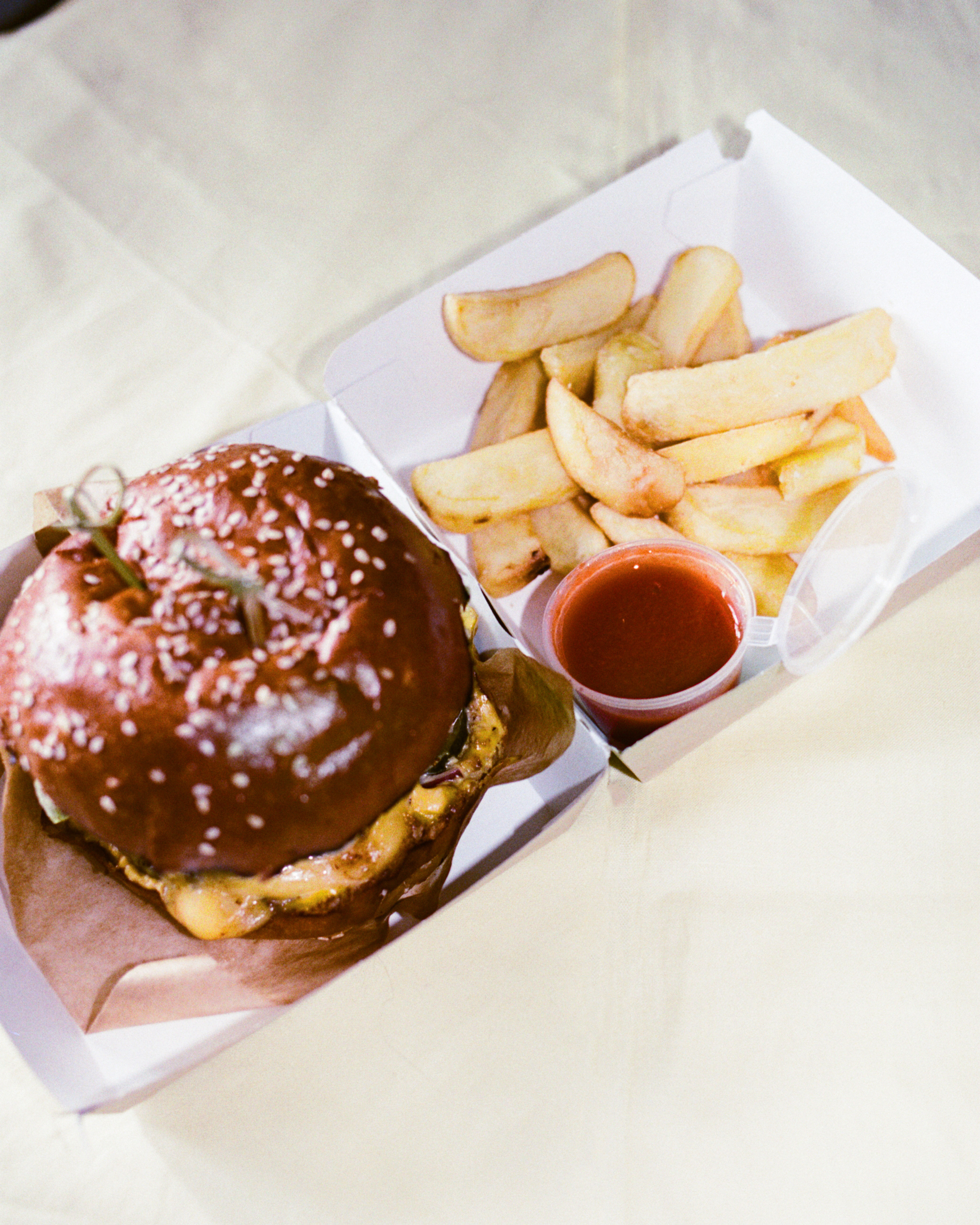 burger and fries in the package