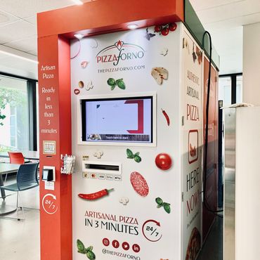 An indoor PizzaForno kiosk inside a university
