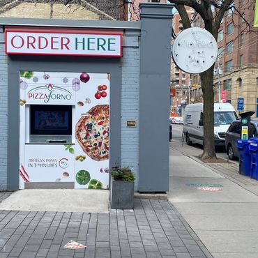 An ATM style PizzaForno kiosk.