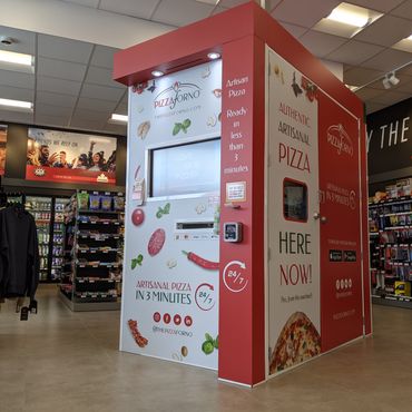 A PizzaForno indoor kiosk thats located inside a store