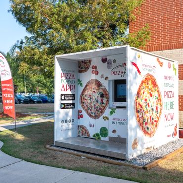 An outdoor PizzaForno unit located outside of a college campus