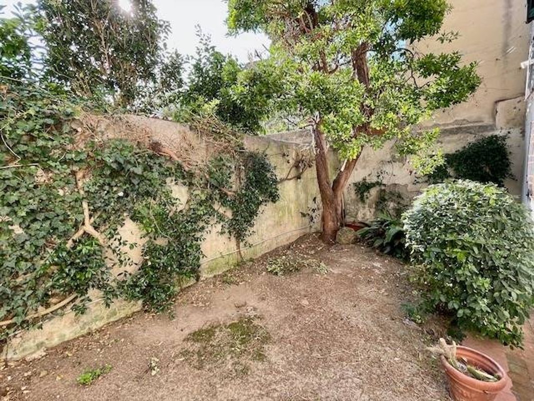 Ampio Bilocale con Giardino in Piazza del Carmine