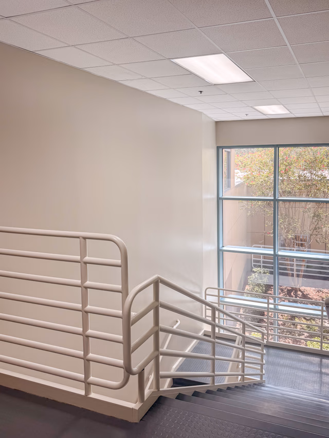 Healthcare project at Moffitt Cancer Center MRC Stairway Lighting & Painting, image 2 by Envision Construction Services