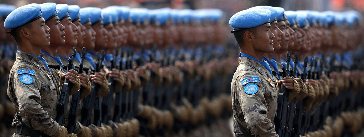 Strong participation: Chinese UN peacekeeping forces march during a parade; China’s expanding role in peace operations highlights its growing prominence within the UN. Image: Associated Press / Alamy