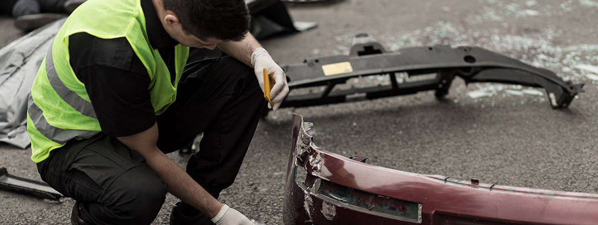 Image showing investigator at scene of car bomb