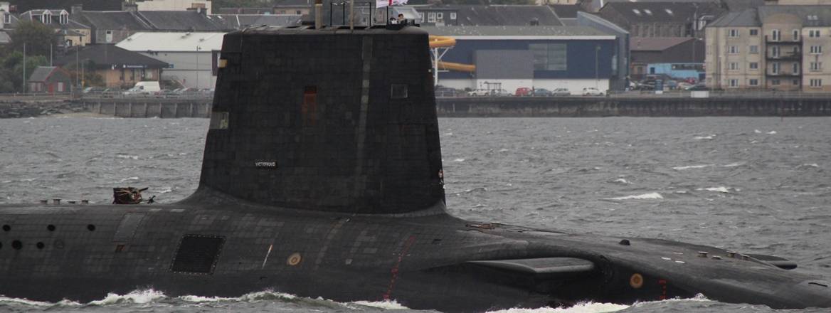 HMS Victorious (S29), a Vanguard-class submarine operated by the Royal Navy, passing Gourock on an inbound journey to the Faslane naval base