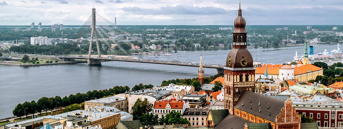 Aerial view from St. Peter Church to the Cathedral and cable-stayed bridge and Riga's old town, Latvia
