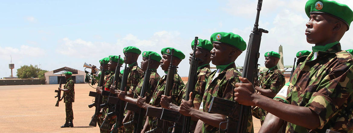 Kenyan soldiers serving under the African Union Mission in Somalia (AMISOM) during a parade in Kismayu, Somalia in December 2015