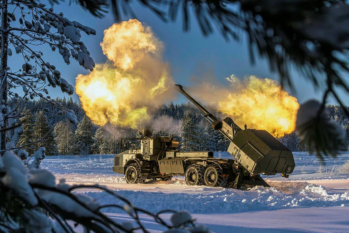 Preparing for the worst: a British Army Archer howitzer fires a 155mm round during a training exercise in Sweden