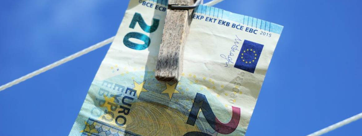 20 banknote in clothes peg