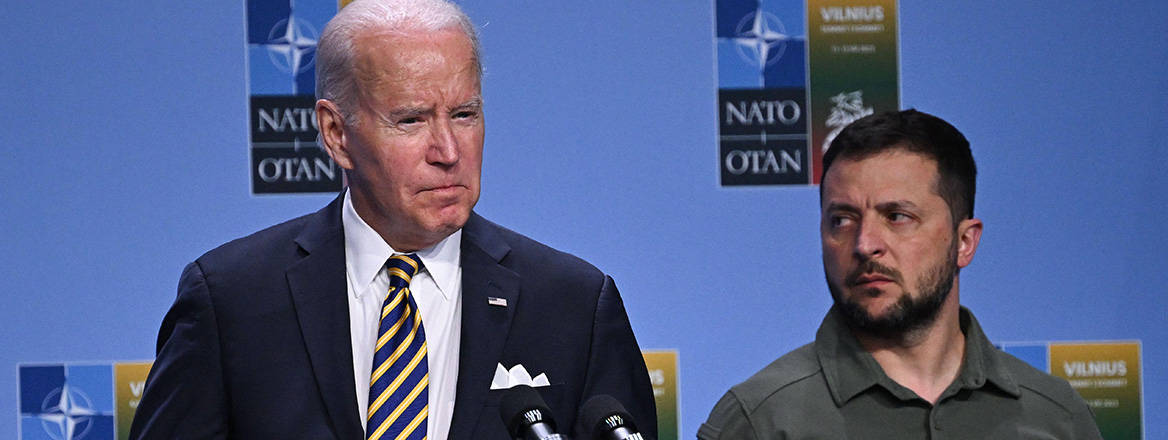 Dashed hopes: Ukrainian President Volodymyr Zelensky listens to US President Joe Biden speak at the NATO Vilnius Summit in July 2023