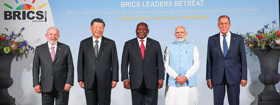 Seeking new recruits: the leaders of Brazil, China, South Africa and India together with Russia's foreign minister at the BRICS summit on 23 August 2023