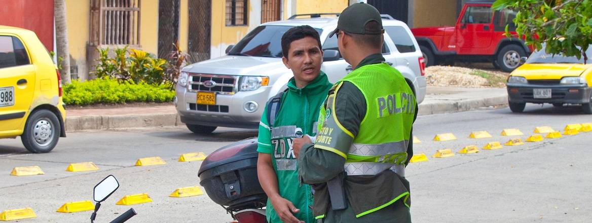 Colombian police issuing a ticket