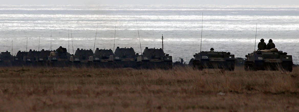 Russian tanks take part in an exercise in Crimea in March 2021. Courtesy of Sergei Malgavko / Alamy Stock Photo