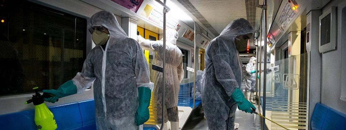 Workers disinfect the Tehran subway