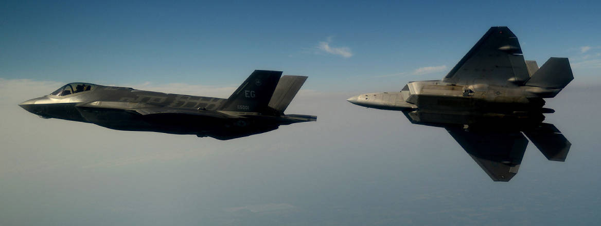 F-35 and F-22 jets in the sky