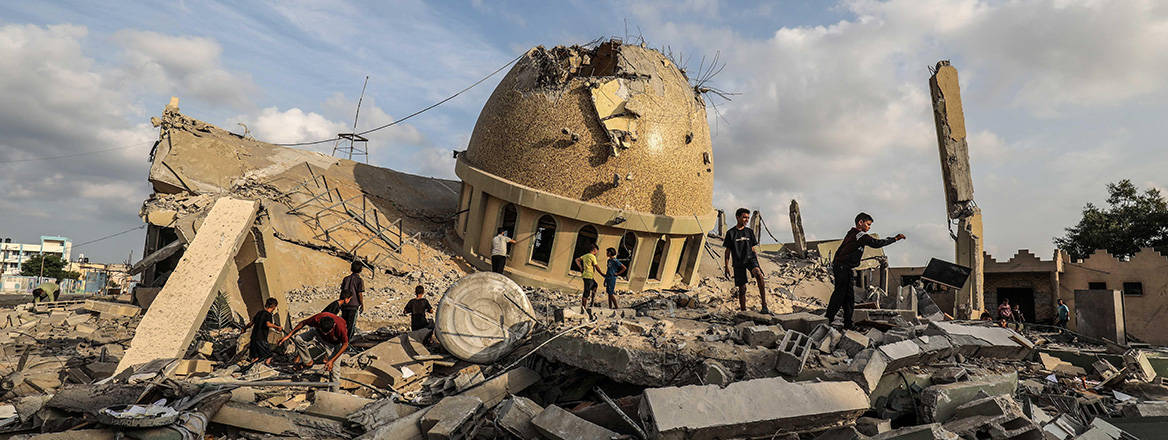 Collateral damage: Palestinians inspect the ruins of a mosque in Khan Yunis following an Israeli airstrike in October 2023