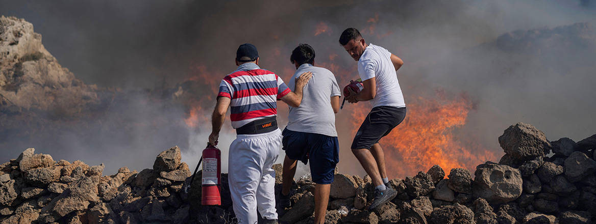 Unprecedented threat: the risks posed by climate change have been highlighted by recent wildfires across Europe