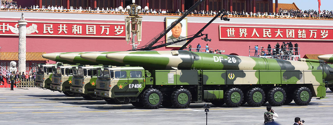Military vehicles carrying DF-26 hypersonic long-range anti-ship missiles pictured during a parade in Beijing in 2015