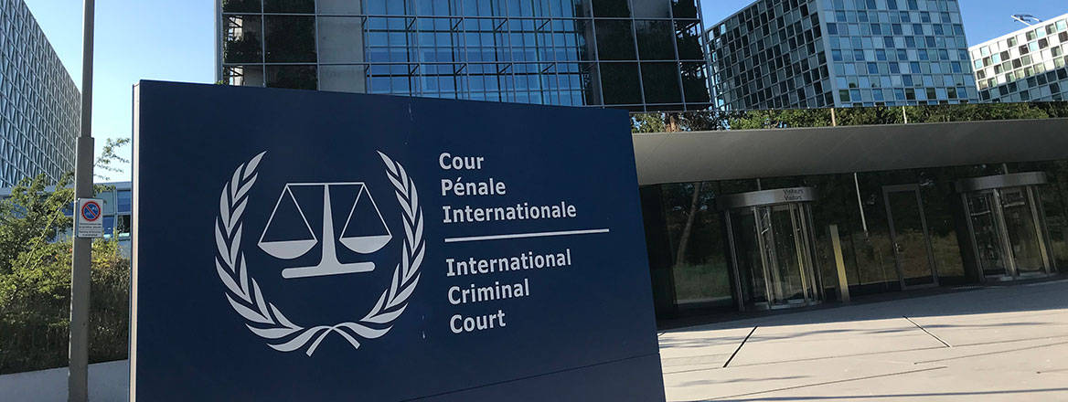 The sign (in French and English) of the International Criminal Court, outside its building
